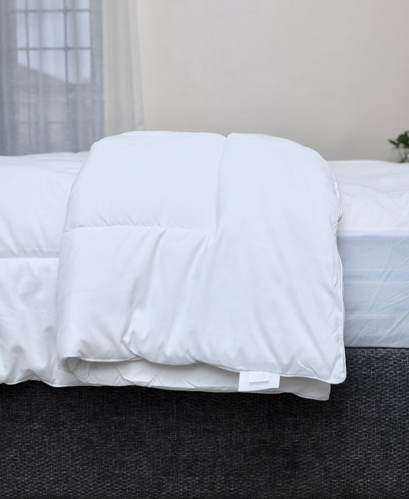 lightweight duvet available in king and grand king sizes. Breathable down-alternative fill for airy comfort and cooler nights.